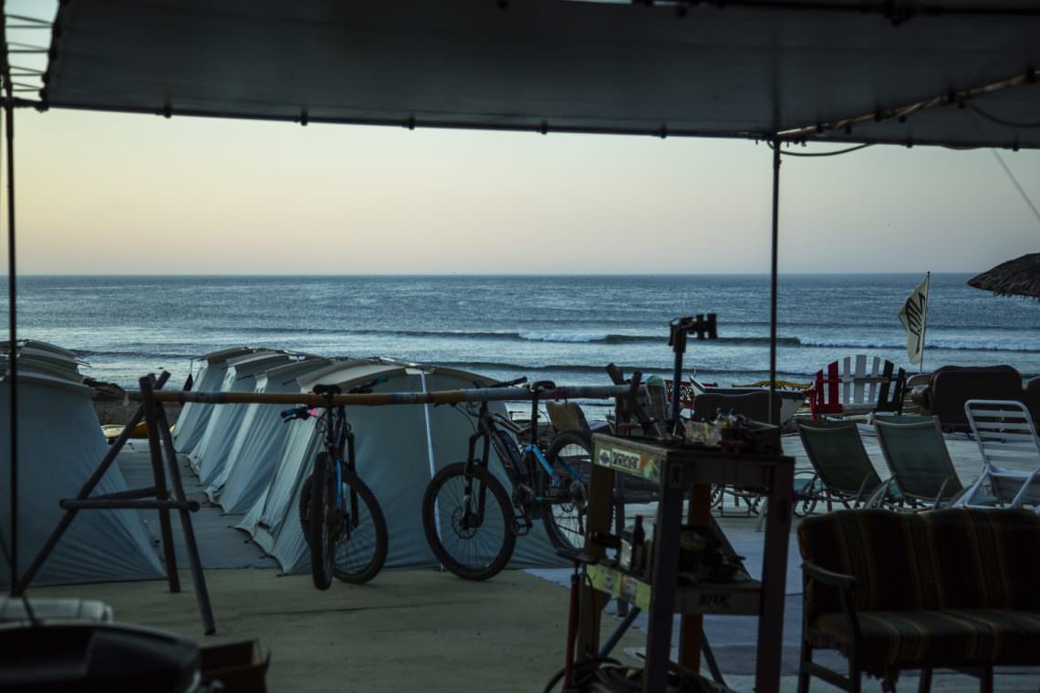 Tents, bikes, and empty surf. The bikers dream.
